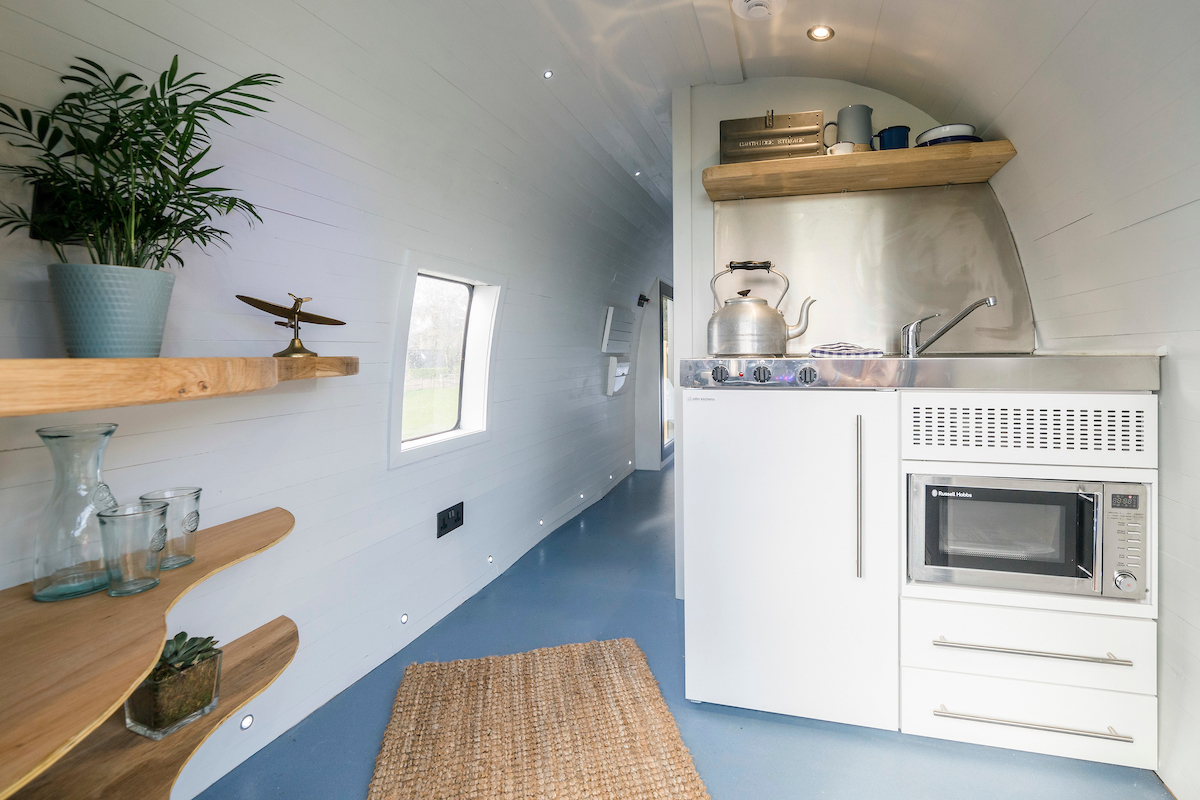 Sea King helicopter converted to glamping accommodation at Mains Farm Wigwams, by Stirling, Scotland. As featured on Channel 4 TV series, Amazing Spaces.