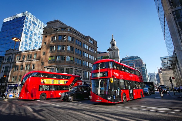 A classic double-decker bus in London, a cheaper form of transport than the Tube.