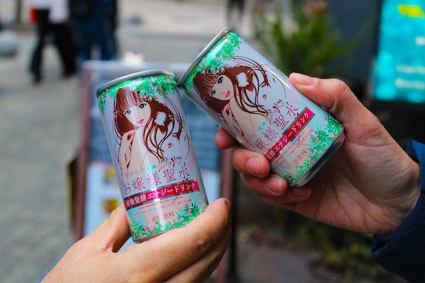 Two cans of Lady Pee Soda from Arima Onsen