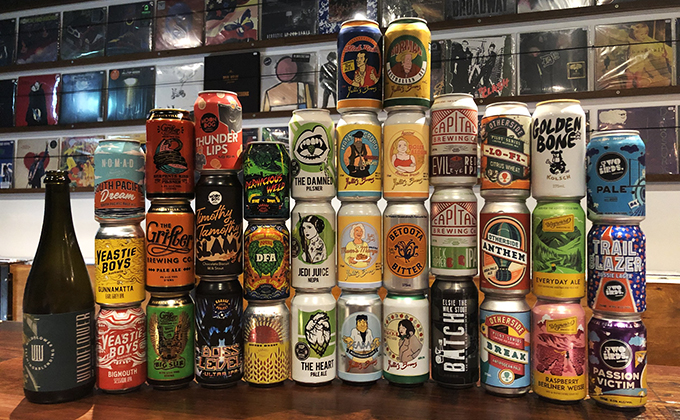 Towers of craft beer cans stacked up on the bar at Cottonmoud Records.