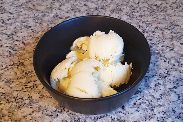 Closeup of homemade mayonnaise ice cream in a bowl.